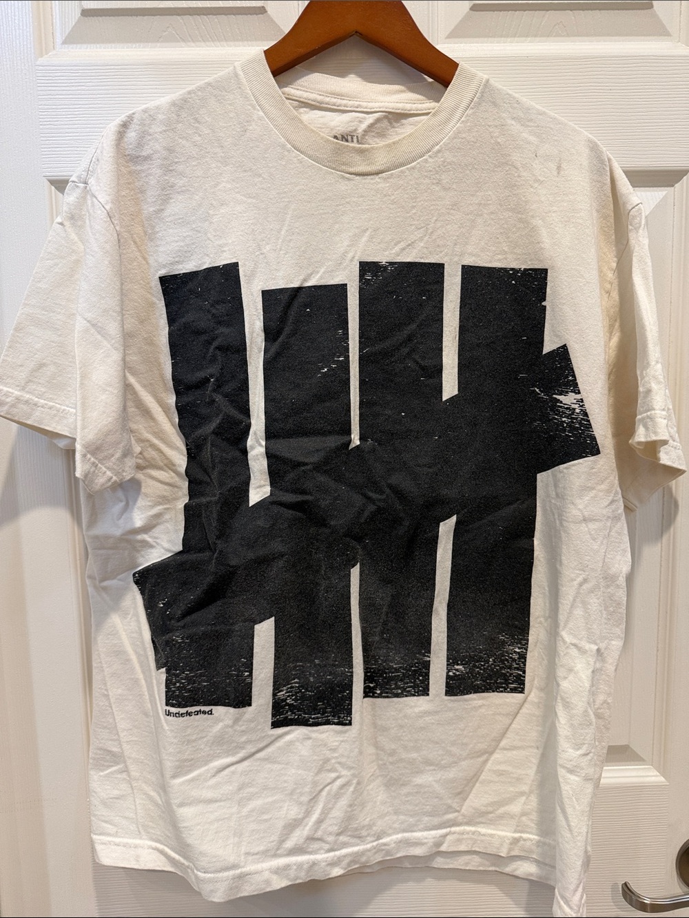 Undefeated x ASSC White Short-Sleeve Tee with Distressed Black Logo
